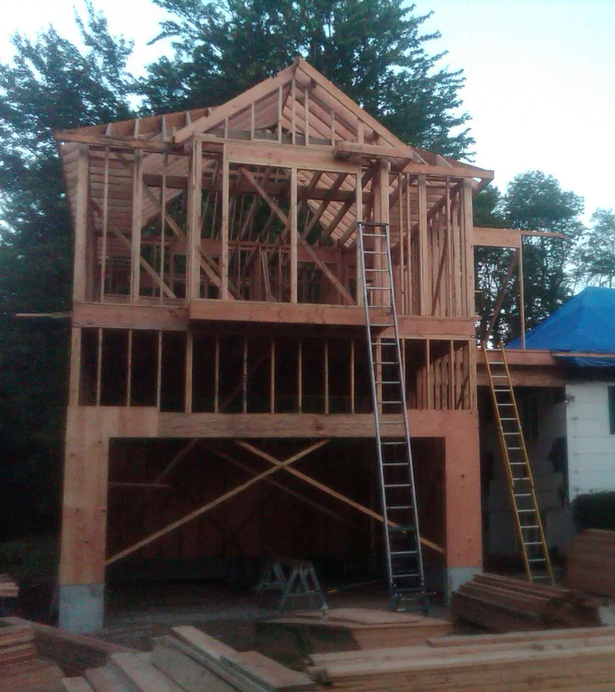 A house being built with some wood framing